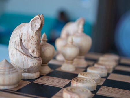 Thai wooden chess on checker chess boardの写真素材