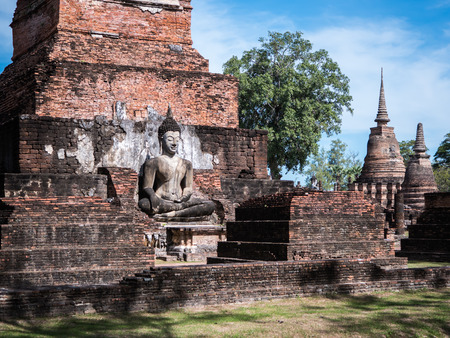 Ancient Buddha statue in Sukhothai historical park, landmark in Thailandのeditorial素材