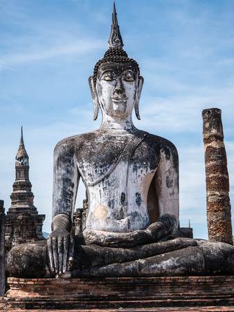Ancient Buddha statue in Sukhothai historical park, landmark in Thailandのeditorial素材
