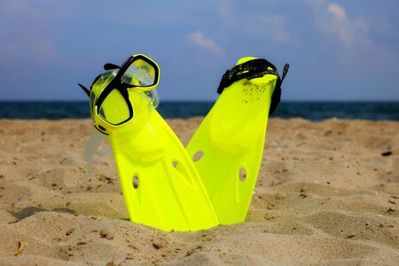 Snorkeling mask on the sandy beachの写真素材