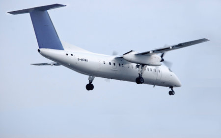 De Havilland DHC-8-311 G-WOWA on approach for landing at LBA. UK February 2012.