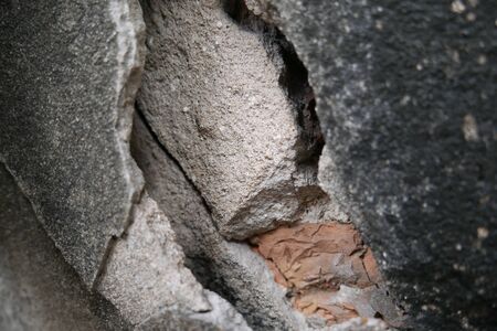 Background textured Crack surface cement on the walls and block brickの写真素材