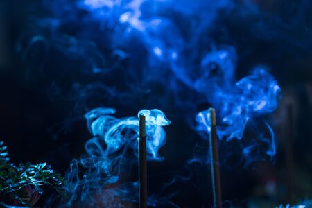 Smoke from burning incenseの写真素材