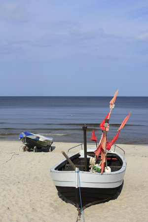 fishermans boat on the beach of the Baltic Seaのeditorial素材