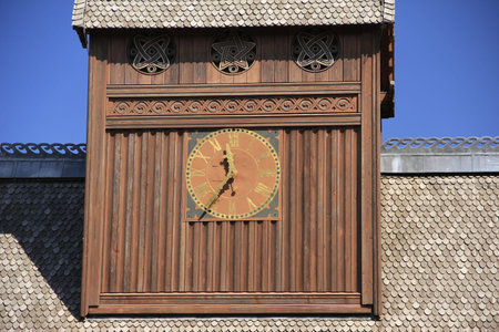 clock of the nordic wood church in Hahnenklee-Bockswiese near Goslar, Lower Saxony, Germany