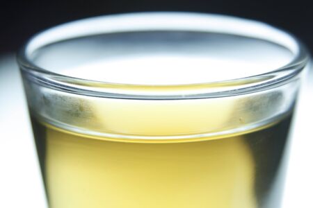 Glass with yellow drinkの写真素材