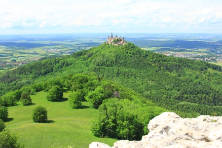 View from the top of Zeller Horn to Hohenzollern Castle in the Swabian Alb, Baden-Wuerttemberg, Germanyの写真素材