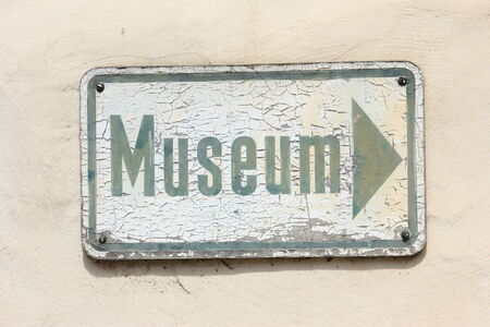 Weathered sign to a museumの写真素材