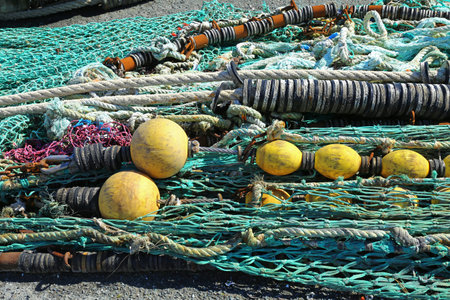 Fishing nets in the port of Loctudy, Finistere, Brittany, France spread to dry
