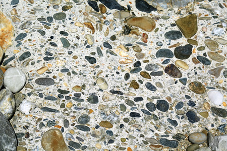 Concrete wall with big pebbles