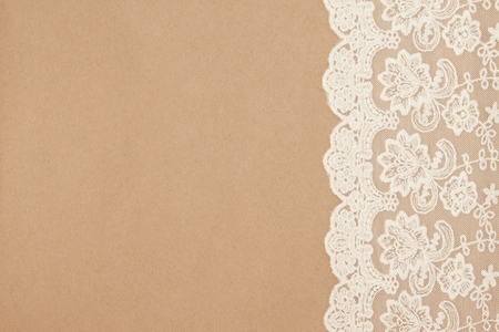 Vintage lace on a cardboard background. Packaging. Boho style.の写真素材
