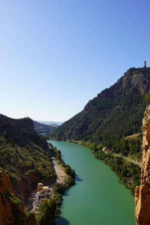 Hiking trail Caminito del Rey, Kings Walkway, in Malaga Spain, narrow footpath leads through natural beauty mountain range cliff faces of Gaitanes Gorge, hisotric landmark popular tourist attractionの写真素材