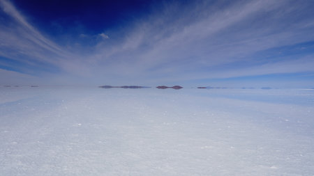 Salar de Uyuni reflection at day time like a giant mirrorの写真素材