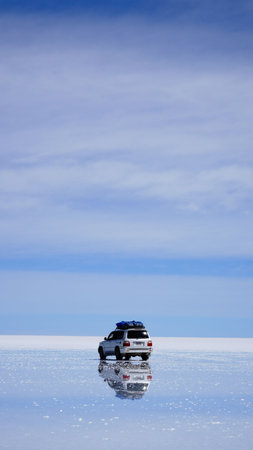 Salar de Uyuni reflection at day time like a giant mirrorの写真素材