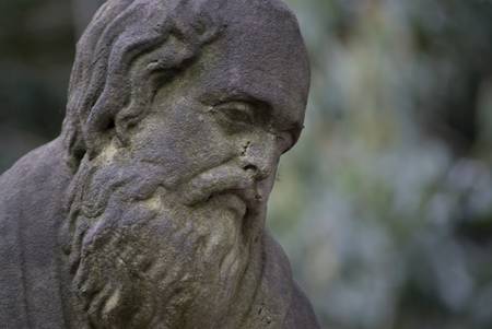 old an with beard garden statueの写真素材