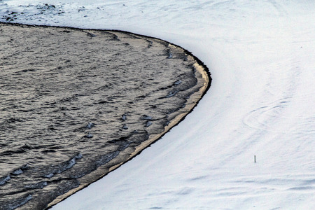 Close up photo of the water and snow by Lake of Kleifarvatn, Reykjanes Peninsula, Iceland.の写真素材