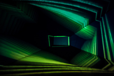 Abstract Light Painting Photography of green lights in a box.の写真素材