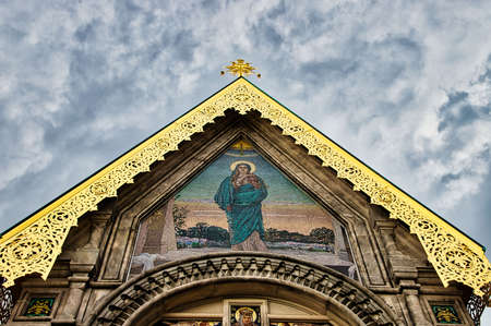 Golden cross on the roof of a russian orthodox churchの写真素材