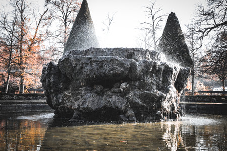 Fountain in the park in autumn, Russia. Toned.の写真素材