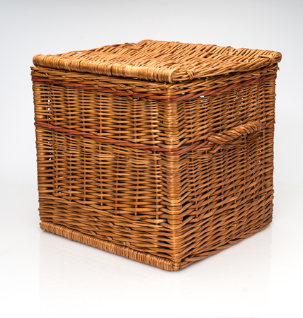 Wicker Basket On White Background on its ownの写真素材