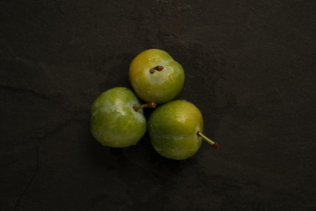 Trio of arranged greengages.の写真素材