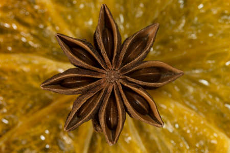 Star anise and orange close upの写真素材