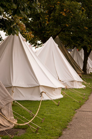 vintage army tents in a field