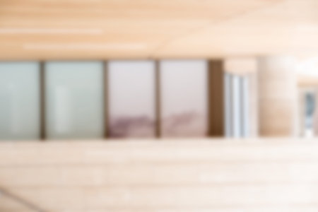 Defocused exterior building background with mirror reflective windowns