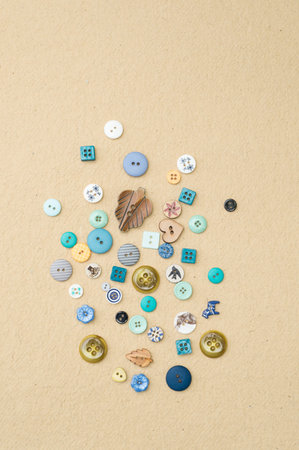 A collection of clothing buttons of various shapes and sizes