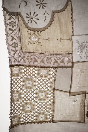 Patchwork fabric over lighted background