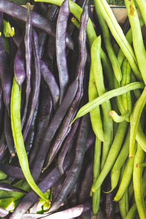 Closeup of purple and green string beans