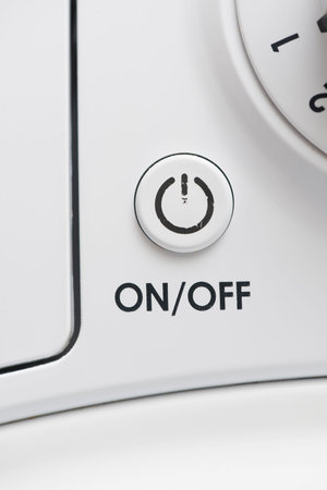On and off power button or switch of a domestic appliance