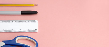 Banner image of office supplies and tools including a pair of scissors, a plastic ruler, a marker...