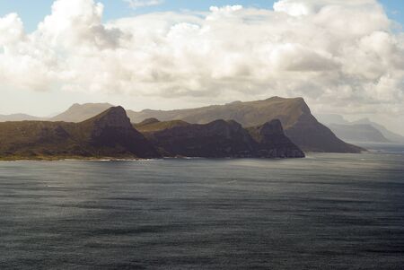 Mountains and cliffs by the ocean seascapeの写真素材