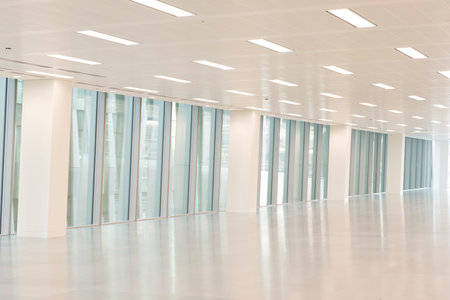Row of glass panel windows in an empty office interior