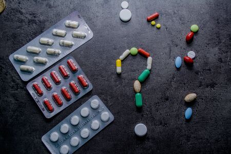 Medicines and money. Expensive medicine.Taking the medicine?のeditorial素材