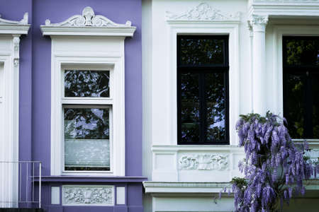 Townhouse facade with syringa in springの写真素材