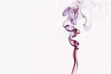 Colerful smoke raising and swirlingの写真素材