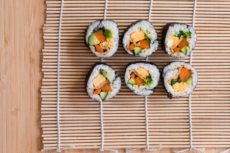 Korean gimbap aka kimbap on a suhi roll matの写真素材