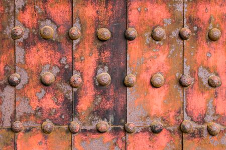 Iron fortified plate abstract background with iron knobsの写真素材