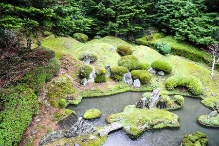 Japanese Zen Garden with Pond and Treesの写真素材
