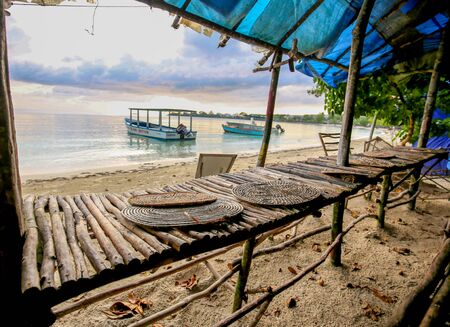Abandoned merchant stands on an ocean shore.の写真素材