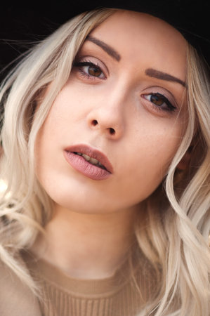 Warm portrait of a beautiful young girl
