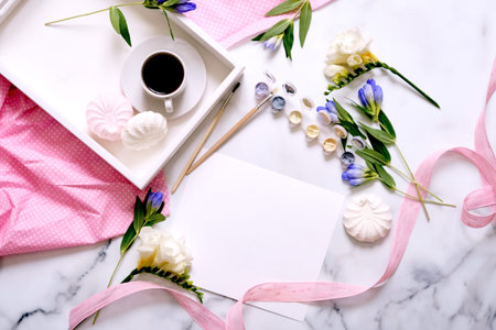 Women's desk. Flat lay, top view. Home office workspace. Creative feminine background. Coffee,...