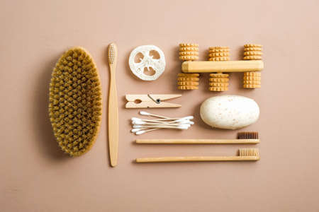 Set of eco friendly bathroom accessories. Flat lay bamboo toothbrushes, luffa sponge, handmade soap, spa brush, ping, wooden massager. Zero waste, plastic free concept.の写真素材