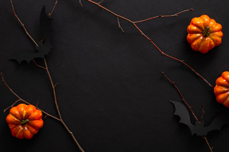 Modern Halloween background with pumpkins, bats, decorations. Halloween party invitation card...