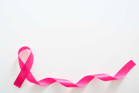 Breast cancer awareness symbol pink ribbon isolated on white. Healthcare and medicine conceptの写真素材