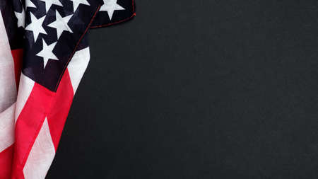 American flag on black background. Banner mockup for Memorial Day or 4th of July Independence Day in United States.の写真素材