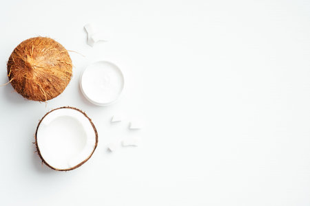 Coconut organic cosmetics, coconut cream, oil, lotion for skin care or hair treatment. Natural...