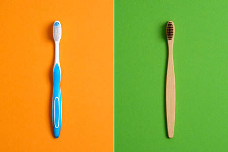 Plastic Toothbrush vs Eco-Friendly Bamboo Toothbrush. Comparison concept. No plastic, Zero Waste, Sustainable Lifestyle. Choice Plastic Free Oral Health Care Itemsの写真素材
